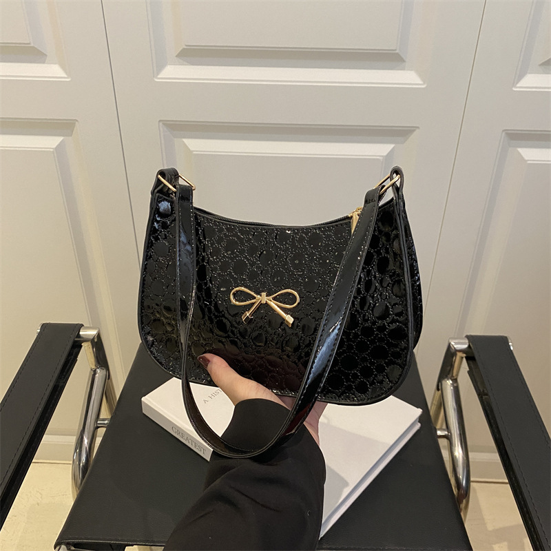 Estilo caliente de primavera y verano, diseño de moda, todo fósforo, casual, bolso de viaje diario, bolso de axila de hombro nuevo para mujer 2025