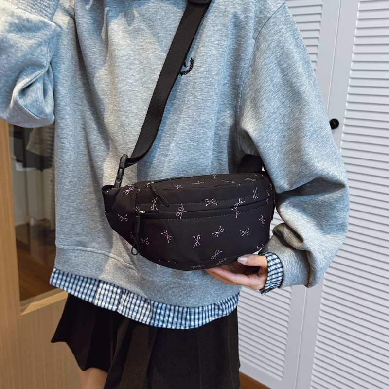 Pequeño fresco lindo bolso de pecho de arco impresión extranjera mochila de bebé 2025 comercio exterior transfronterizo bolso de cintura de niños