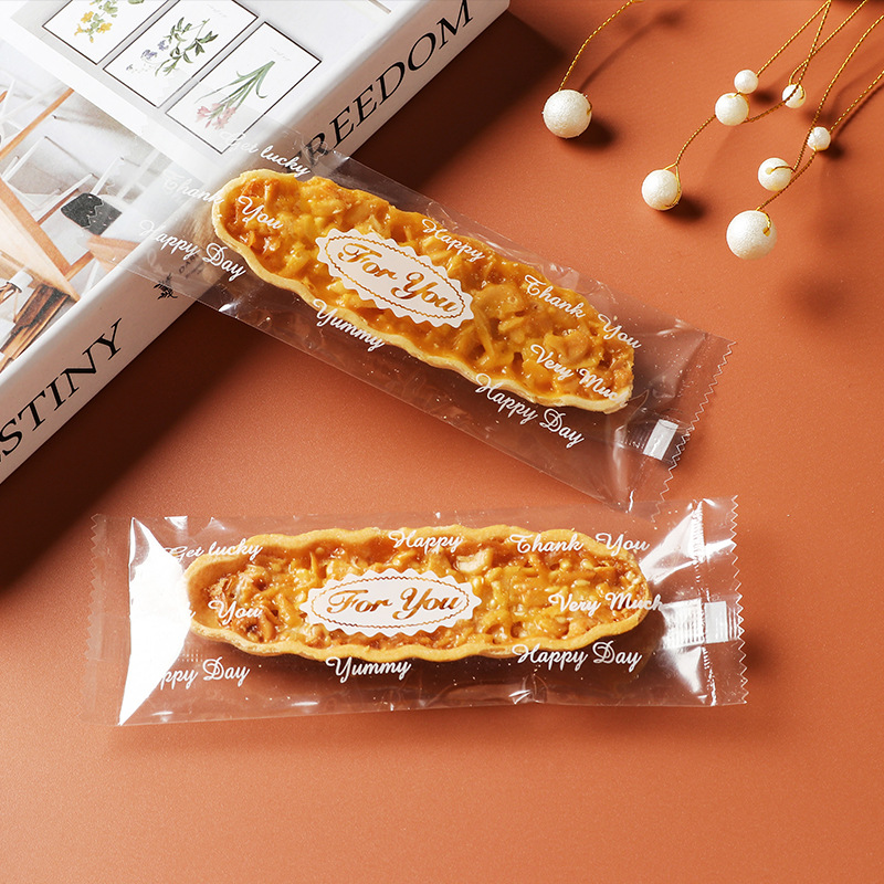 Clásico tipo barco de arroz glutinoso embalaje rectangular máquina de hornear bolsa de sellado en stock fábrica al por mayor bolsa de embalaje de piruletas