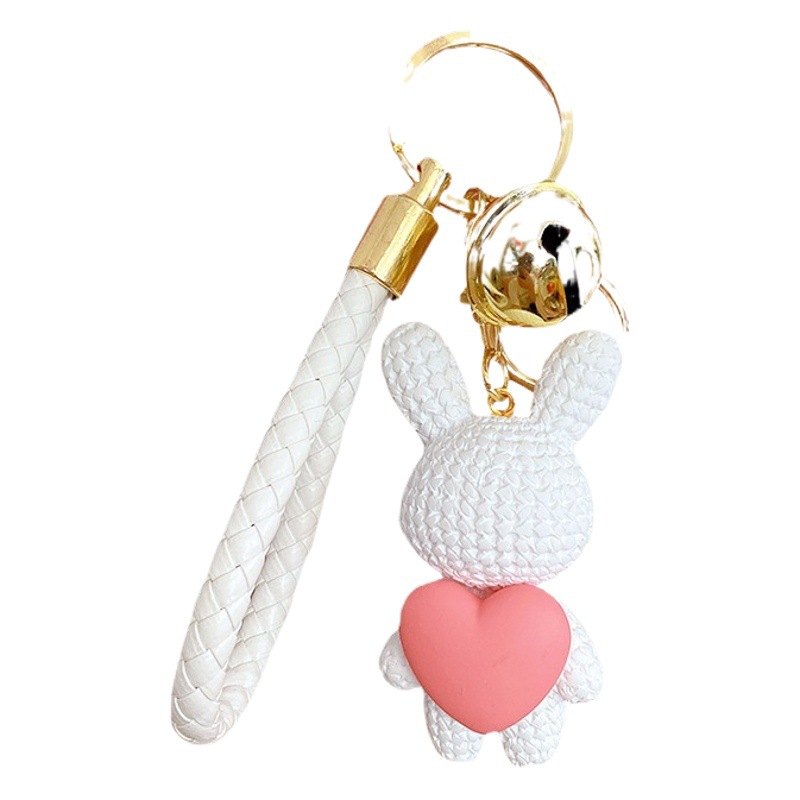 Resina creativa melocotón corazón tejido amor conejo llavero al por mayor ins pareja escuela coche llavero colgante