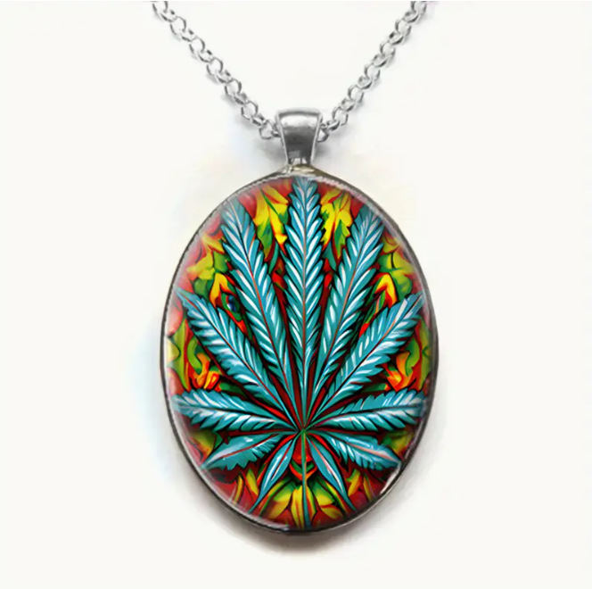 XLL-96 oval glass pendant necklace with exaggerated leaf pattern