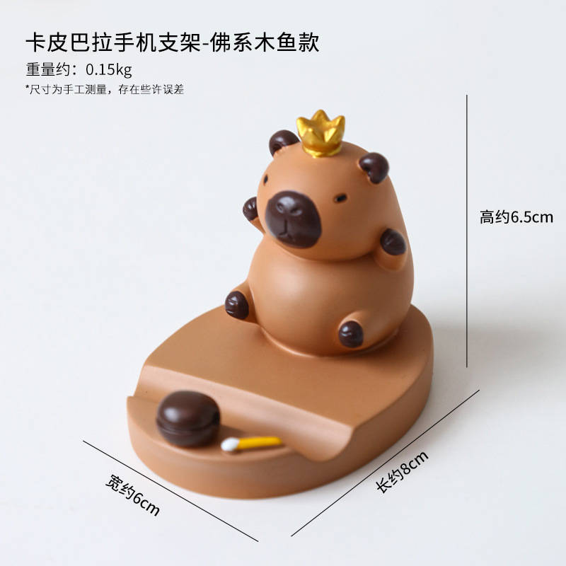 Dibujos animados linda celebridad de Internet Kapibala soporte para teléfono móvil decoración escritorio de oficina estación perezosa soporte plano artefacto