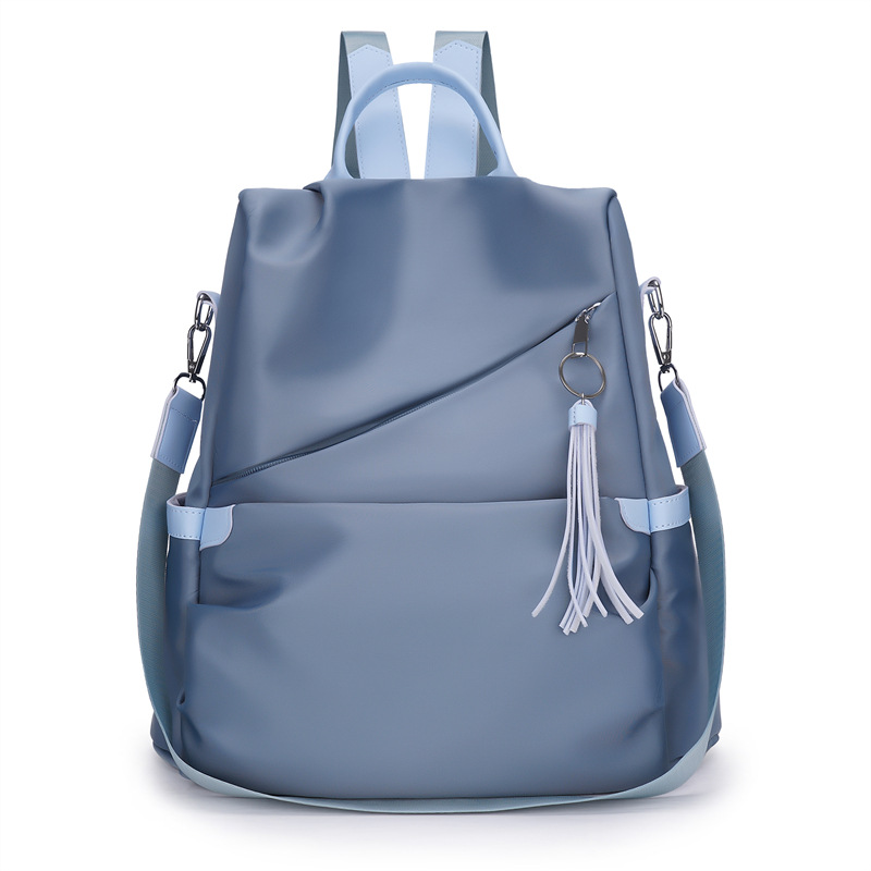 2023 nuevas damas casuales tela Oxford mochila antirrobo moda borla mochila de viaje multifuncional cabello