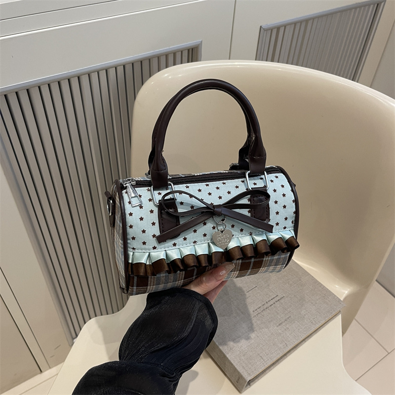 2025 nuevo arco de punto ondulado de alto valor, mochila de encaje a cuadrícula, mochila escolar universal para niñas, mochila