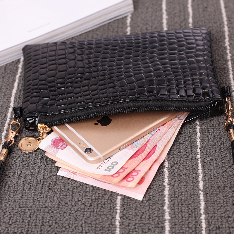 Una bolsa de mujer, bolso de moda 2024 bolso de hombro de mujer, bolso de tela de cocodrilo, bolso de cambio de teléfono móvil