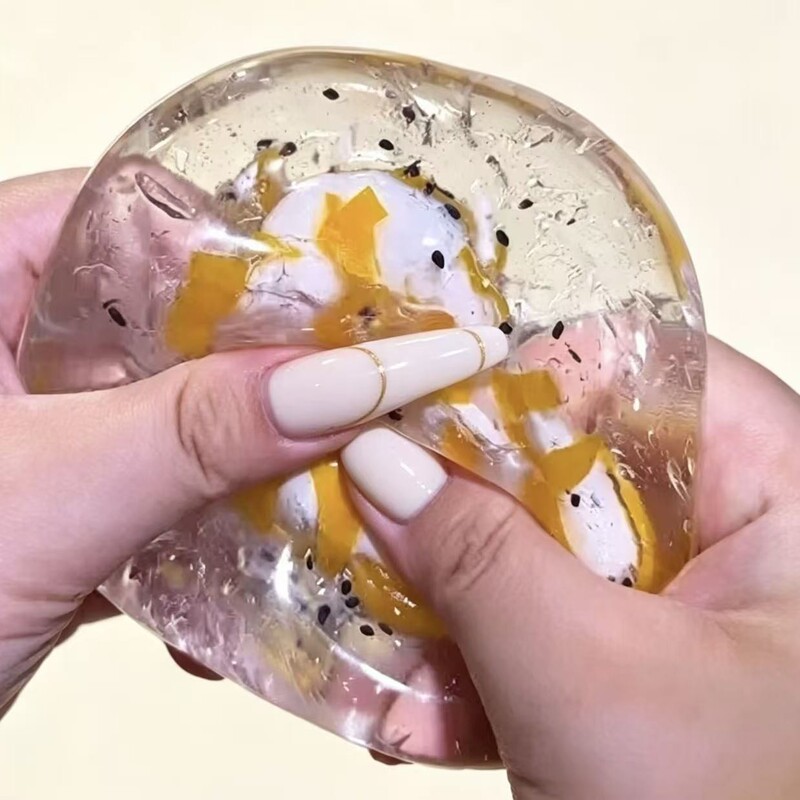 Simulated sesame and egg yolk crispy ball, handmade, squeezable, sound-activated, and designed to relieve stress and provide a calming effect