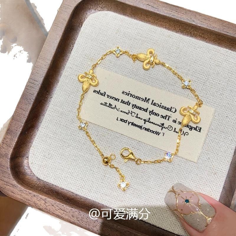 「金玉良縁」中古の金色のアイリスのブレスレットの高い顔の値は少しジルコンを入れてプレゼントします。|undefined