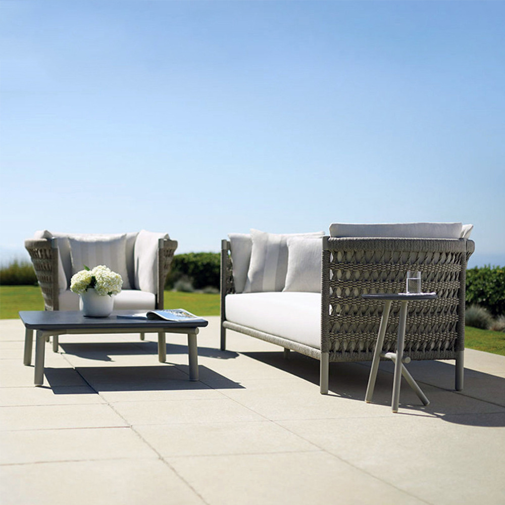 Wicker balcony outdoor garden table, suitable for villas, guesthouses, and courtyard settings, featuring a classic design