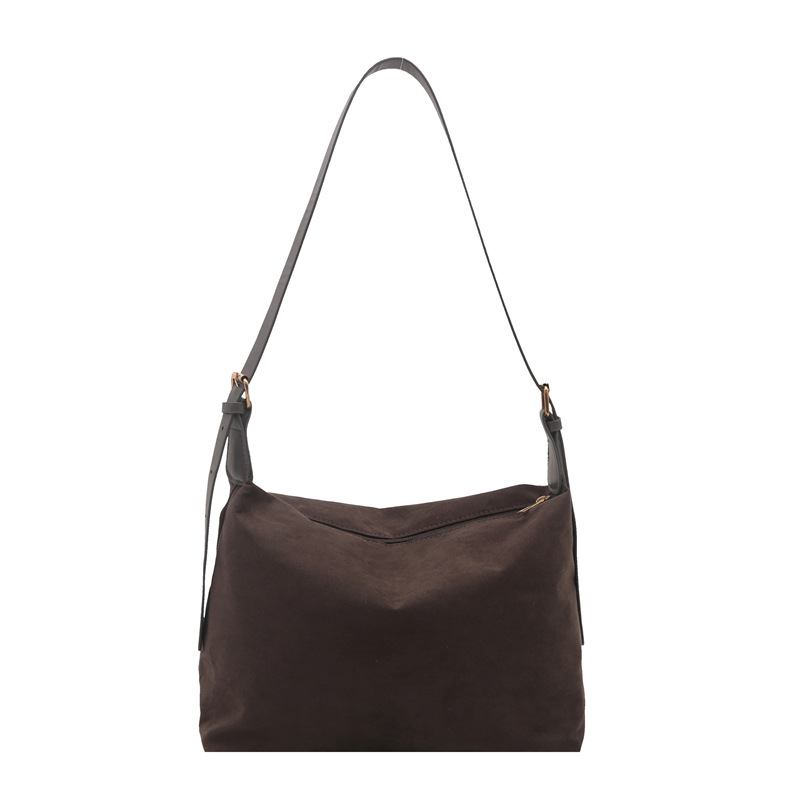 2025 primavera europea y americana estilo retro gaudón estilo de diseño de gran capacidad de viaje temperamento simple bolsas de hombro para mujeres