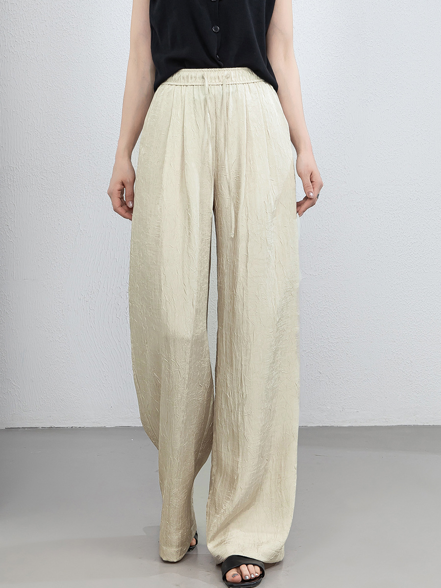 Quần culottes nữ ống rộng chất liệu mềm mại, cạp chun, dáng suông rủ nhẹ — màu trắng ngà