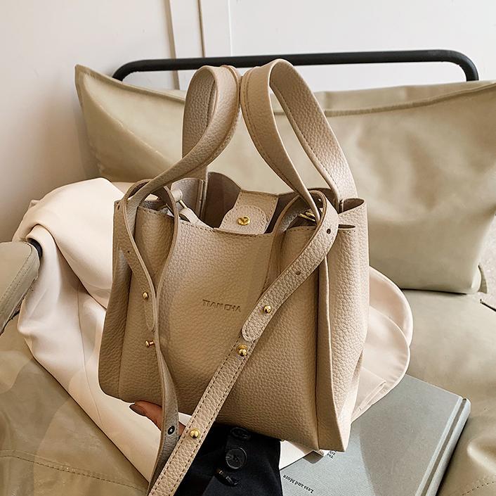 Bolso de cesta de verduras portátil más vendido transfronterizo para mujer 2025 nuevo bolso de mensajero versátil de alta gama bolso de cubo simple casual