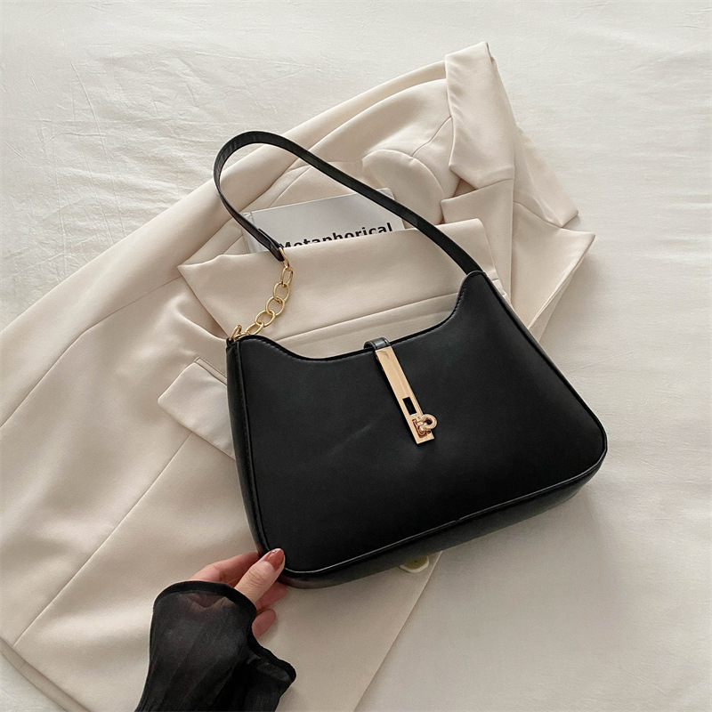 Bolso de alta sensación 2024, nuevo bolso de moda, primavera y verano, simple y versátil bolso de hombro de transporte, bolso de nicho de textura bajo la axila