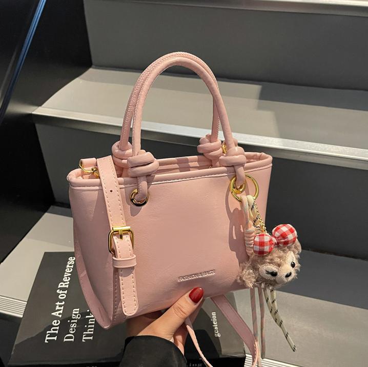 Este año popular bolso de cubo de mano caliente 2025 nuevo bolso de mujer bolso de hombro casual versátil bolso de alta calidad