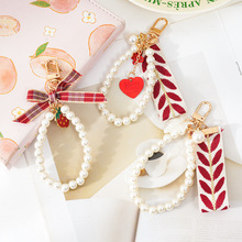 跨境热卖厂家代发小清新珍珠树叶条纹织带手链钥匙扣手机挂绳饰品