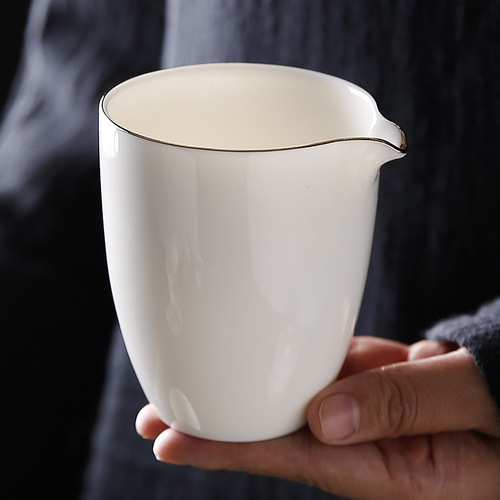 Mutton fat jade white porcelain fair cup tea leakage integrated household tea divider ceramic tea set single tea sea cup filter