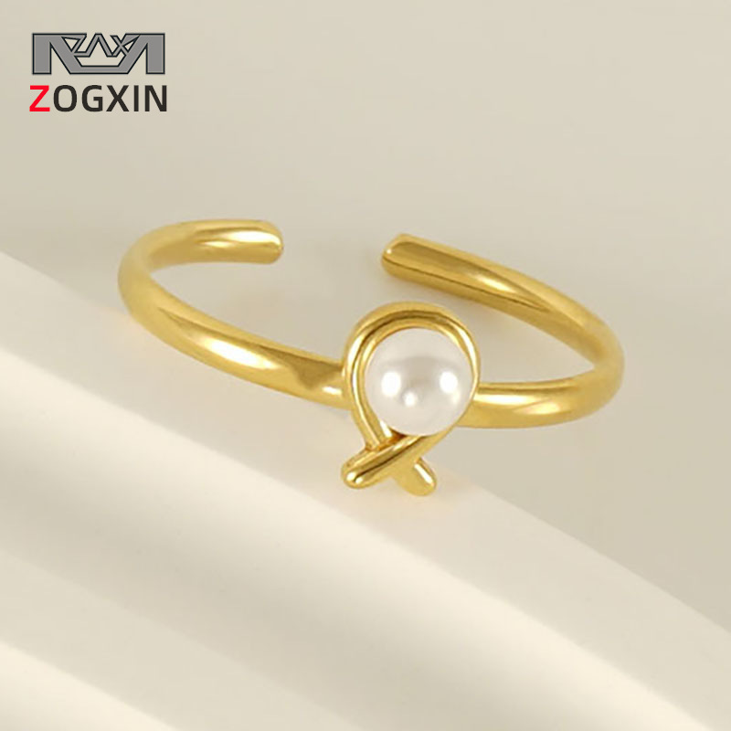 Transfronterizo europeo y americano perla abierta anillo de acero de titanio moda femenina todo partido ajustable dieta anillo de dedo anillo de acero inoxidable al por mayor