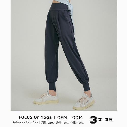 Instagram-famous women's high-waisted, loose-fit workout pants with ankle-cuff design—yoga leggings featuring pockets, perfect for winter running and training sessions.