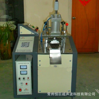 恒巨牌全自动切带机热切机冷切机裁剪设备挈带打孔商标