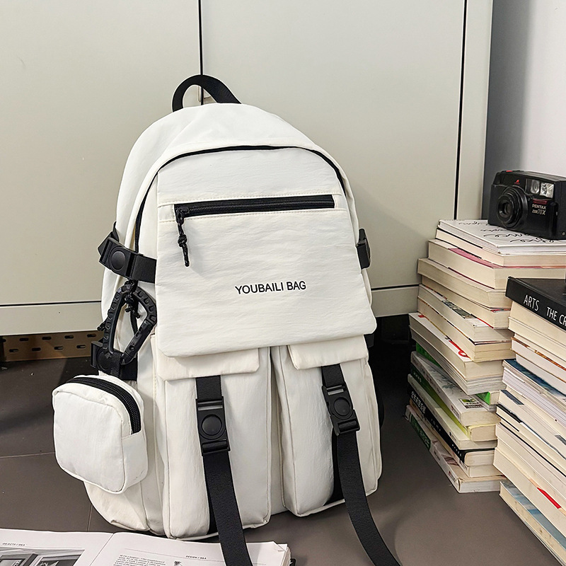 New casual outdoor backpack, unisex design, water-resistant, suitable for middle and high school students, for travel and carrying a laptop