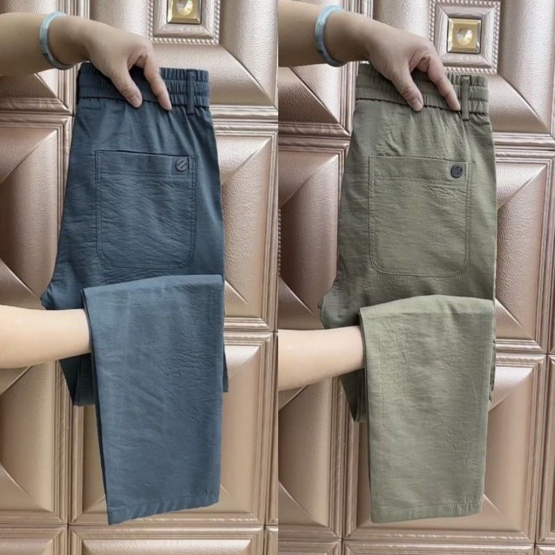 Pantalones casuales para hombres de verano delgados de moda de color sólido negocios versátil pantalones simples y cómodos pantalones largos sueltos transpirables