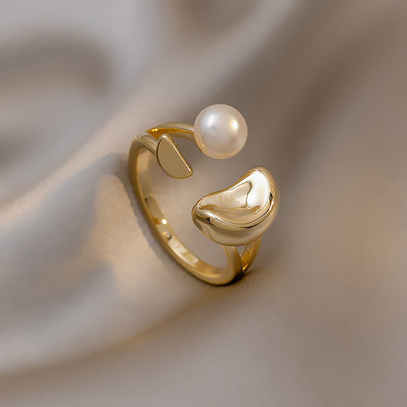 レトロな円形の緑松石の開口指輪の宮廷風の大衆の設計のファッション的な指輪の軽い贅沢な高級感の食指の指輪