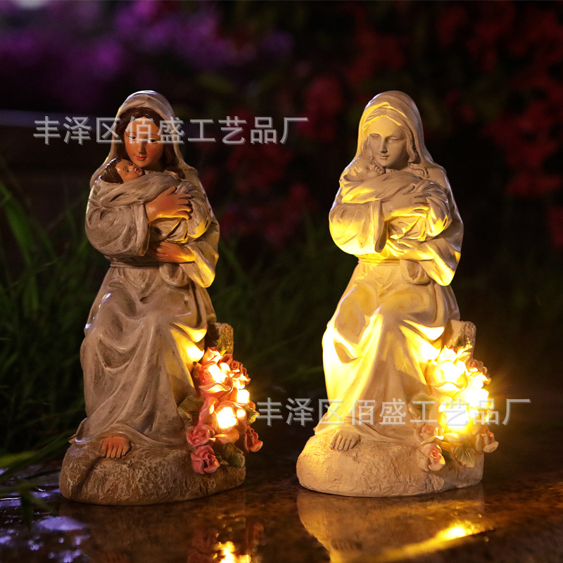 Familia transfronteriza Madre e hijo Acción de gracias Decoración artesanal Madre sosteniendo a su hijo Regalos navideños creativos Decoración de luz LED