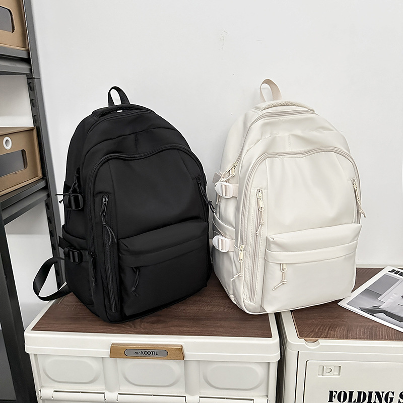 企事业定制LOGO书包初中生双肩背包潮流校园风纯色简约大容量背包