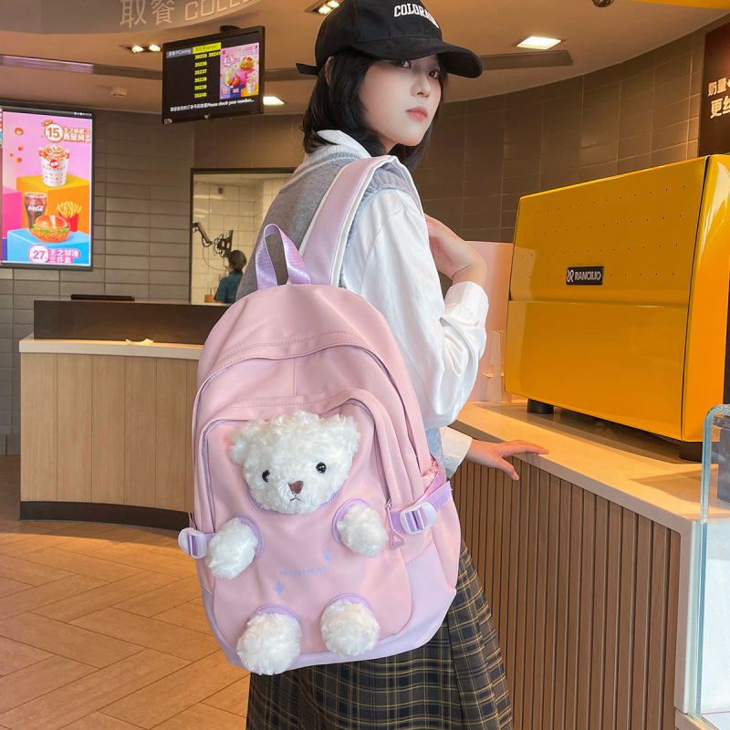 新しいランドセル、女の子、おしゃれな女の子、見栄えの良いリュック、かわいいクマ、中学生、小学生、人形リュック|undefined