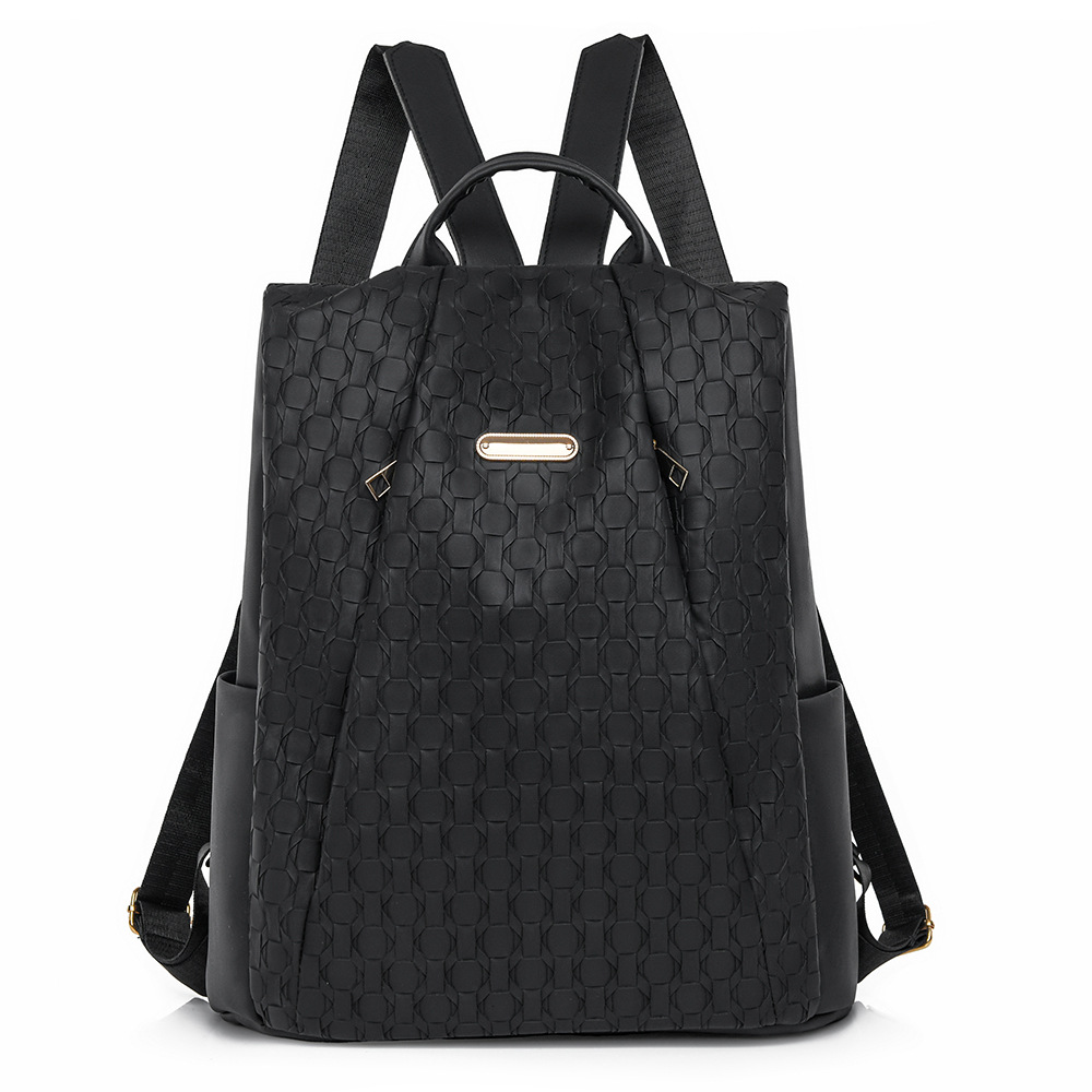 2024 nueva mochila de moda tejida de gran capacidad bolso de mujer simple y versátil mochila portátil de viaje