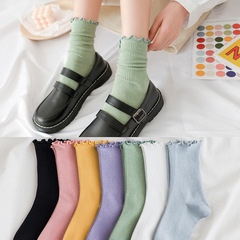 Ankle-length cotton socks with absorbent and breathable properties, featuring a candy-colored, textured design reminiscent of Korean and Japanese styles, suitable for trendy fashion.