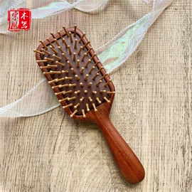 木质工艺品;经络保健器材;美发梳