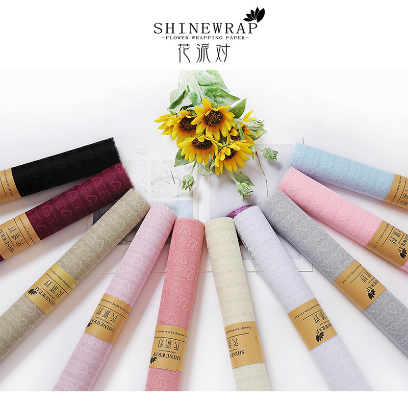 Fábrica de fiestas de flores al por mayor nuevo amor Jacquard flor envasado hilo de malla florista de color sólido