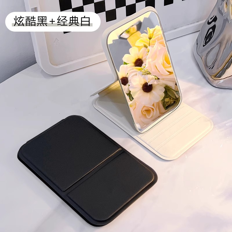 Espejo de maquillaje estilo ins Espejo pequeño plegable portátil Tulip dormitorio de estudiantes espejo de tocador HD escritorio femenino