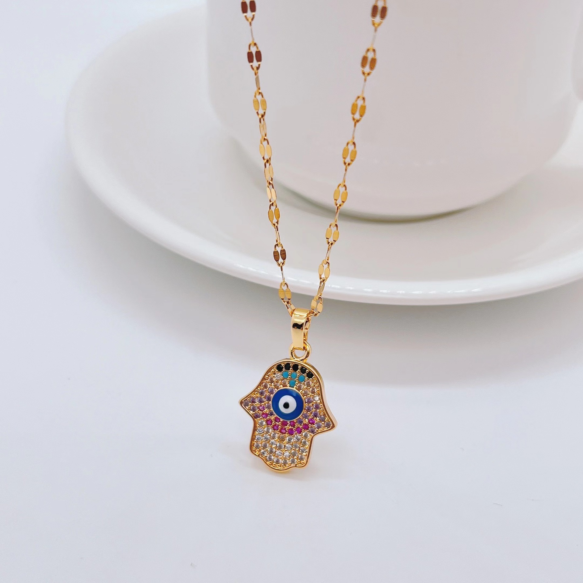 Retro Devilu0027S Eye Palm Titanium Steel Necklace Inlay Rhinestone Stainless Steel Necklaces