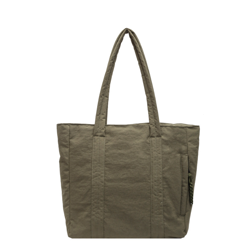 Bolso de nailon de gran capacidad para mujer 2024 nuevo otoño e invierno todo-fósforo bolso de la compra de un solo hombro bolso de viaje de clase simple