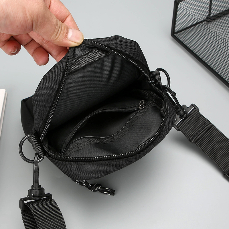 Mini bolso pequeño para hombre, bolso de mensajero de un solo hombro, bolso para teléfono móvil en el pecho, marca de moda casual, mochila deportiva ligera, bolso pequeño