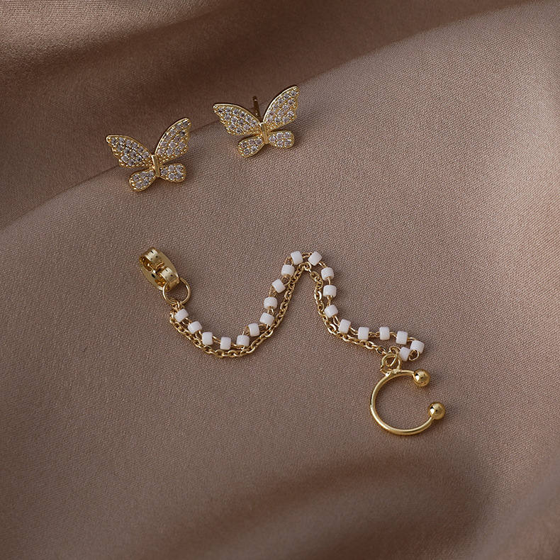 Simple Asymmetrical Pearl Tassel Butterfly Earrings display picture 6