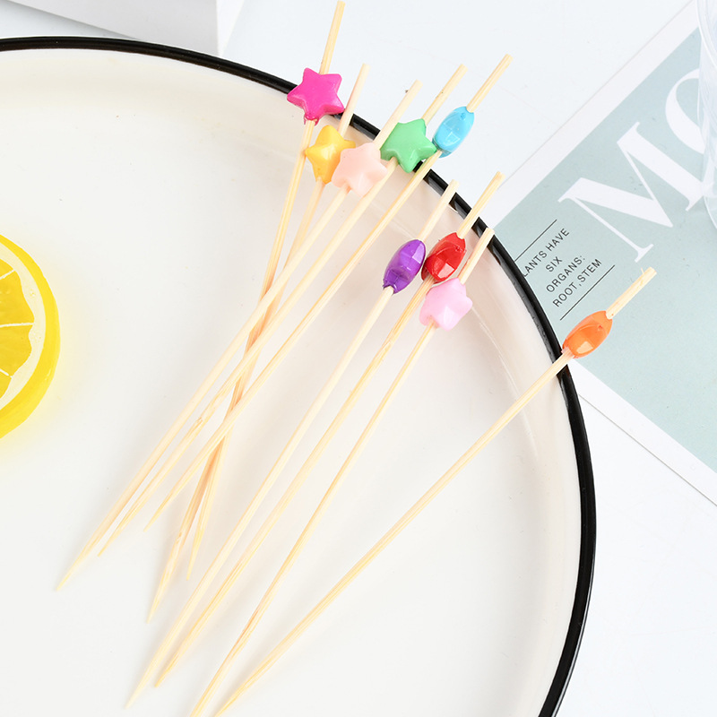 Suministro al por mayor de un palo de fruta desechable, cadena de frutas coloridas, palo de bambú, cadena de limón