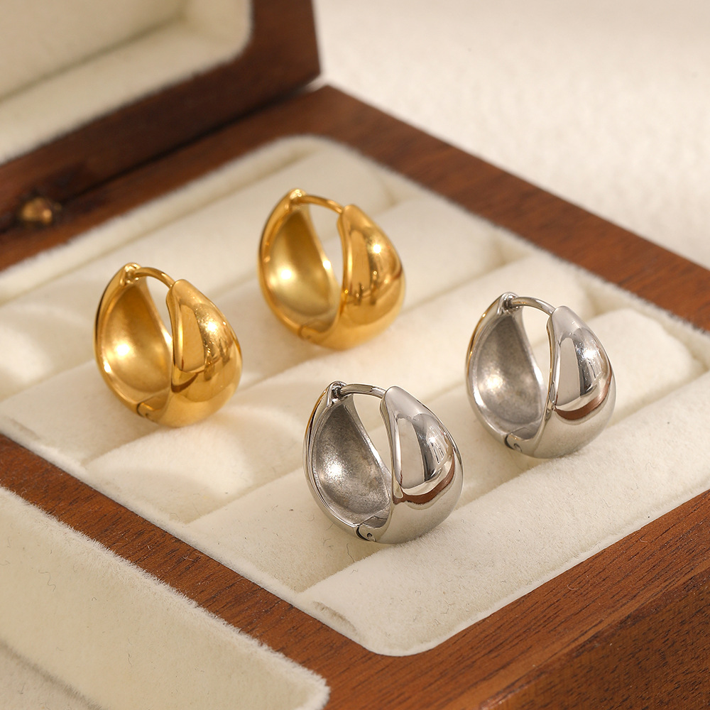 Transfronterizos ins bolsa de aire tipo pendientes de acero inoxidable moda sencilla alta sensación pendientes de acero de titanio