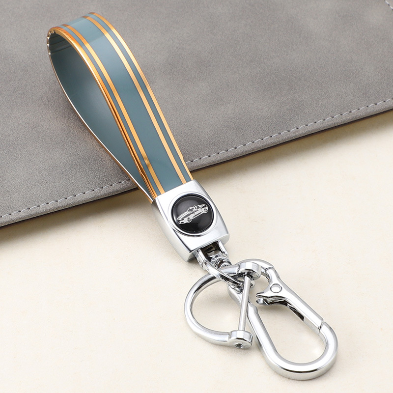 Cuerda de mano de silicona transfronteriza llavero de coche logotipo de coche apellido llavero anti-pérdida llavero de cuerda de mano de silicona duradera