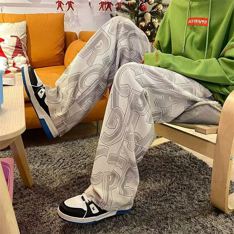 Ins брюки мужские модные спортивные брюки повседневные дикие свободные гонконгский стиль широкие брюки с принтом буквенные брюки оптовая продажа