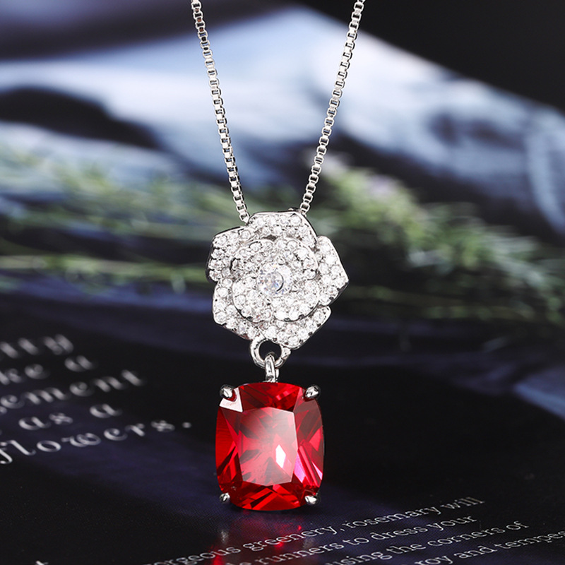 2024 nuevo estilo Zhuang Shengsheng joyería fondo de cobre chapado en oro simulación corindón temperamento retro juego de camelia 10*12