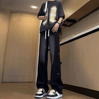黑色渐变牛仔裤男秋冬铆钉拼接设计感裤子美式高街vibe直筒微喇裤