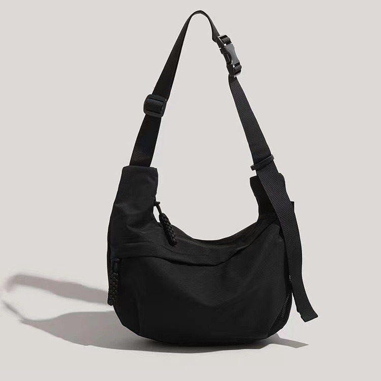 Dumpling Bun Female 2024 New Campus Sports Style Versatile Commuting Large Capacity Tote Classroom Single Shoulder_voghion.com