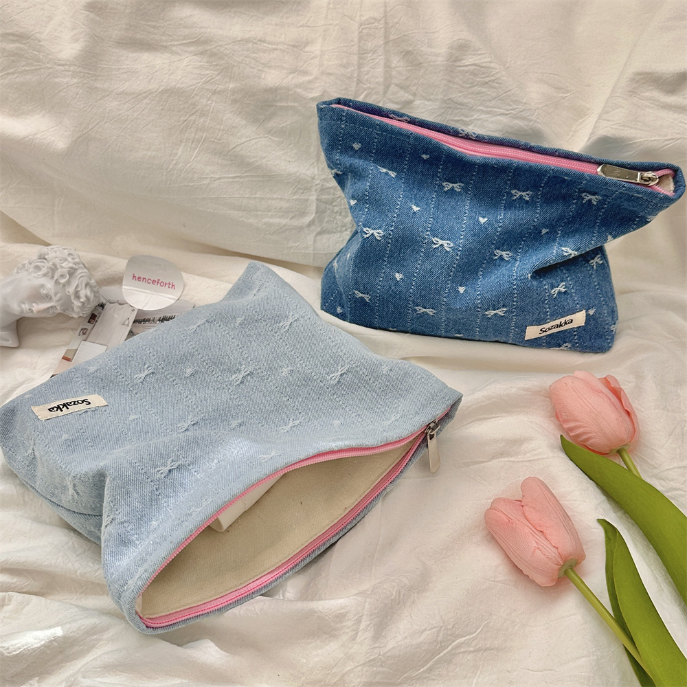 416g Weight Canvas Lining Material Zipper Closure Type / Strap Type Cosmetic Bag Bags Type Holiday, Travel, Daily Occasion Denim Material Bag, Cattle, Knot, Butterfly, Bow Knot Pattern All Seasons Season Women's Gender Cute Style Square Shape Cute Bag Cattle Knot Denim Square Makeup Bags 1