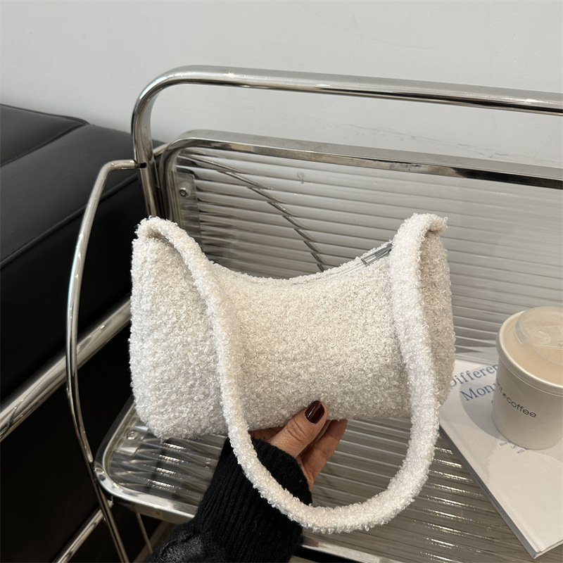 2025 primavera nueva granular cordero hombro brazo bolso de estilo coreano minimalista bolso de mujer bolso de peluche lindo mochila