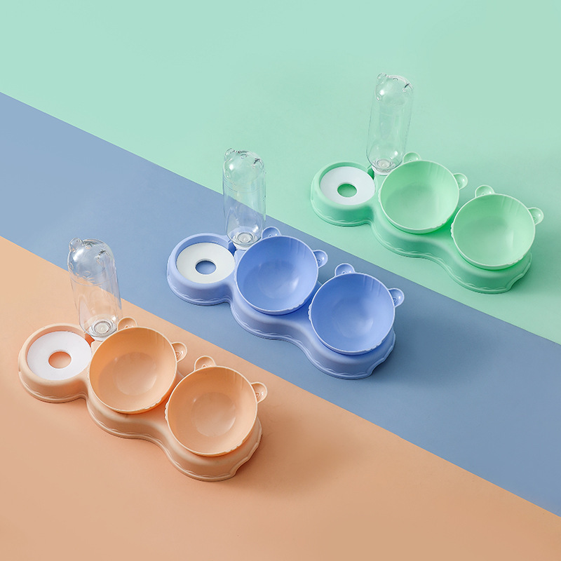 Tazón para mascotas al por mayor tazón de plástico para perros tazón doble tazón de agua potable automática antidetonante tazón de comida tazón de gato tazón de arroz para mascotas