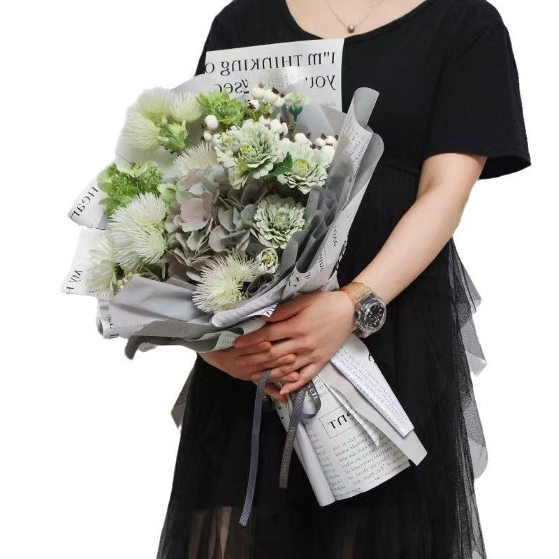 Fábrica de fiestas de flores al por mayor periódico inglés transfronterizo flor de embalaje de flores impermeable doble cara flor de embalaje flor de papel