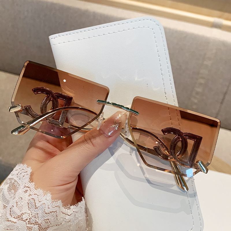 女性用のハイエンドのフレームレスエッジカットサングラス、新しいスタイルのクロスボーダービッグブランド、ハイエンドのメタルサングラス、ファッション用のサンシェード|undefined