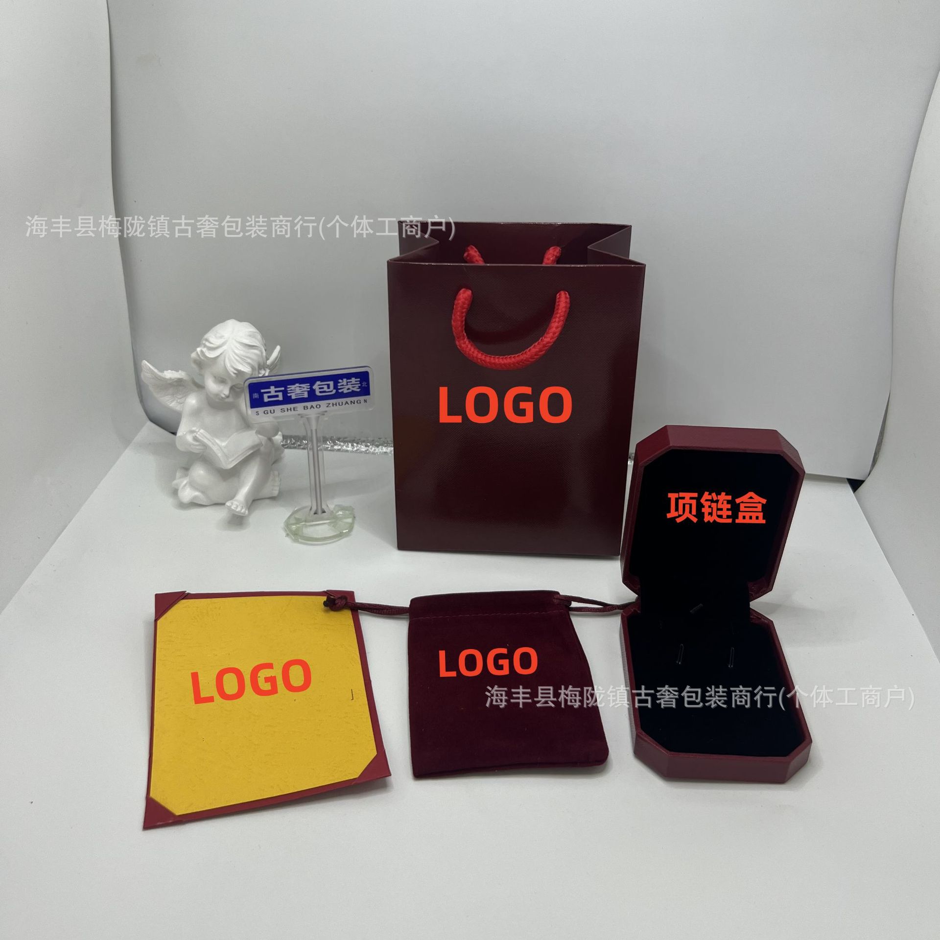 Caja de regalo de joyería roja octogonal de collar de anillo de embalaje del mismo estilo de tarjeta, fábrica de embalaje general al por mayor y al por menor